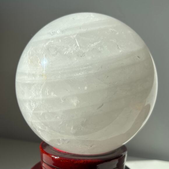 Large Milky Clear Quartz Sphere | Crystal Ball with Wispy Striped Inclusions - Picture 1 of 9